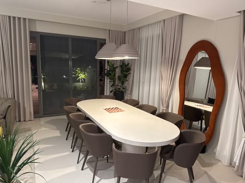 Customer's image of a dining room. The WPC wall panel is not visible in the photo.