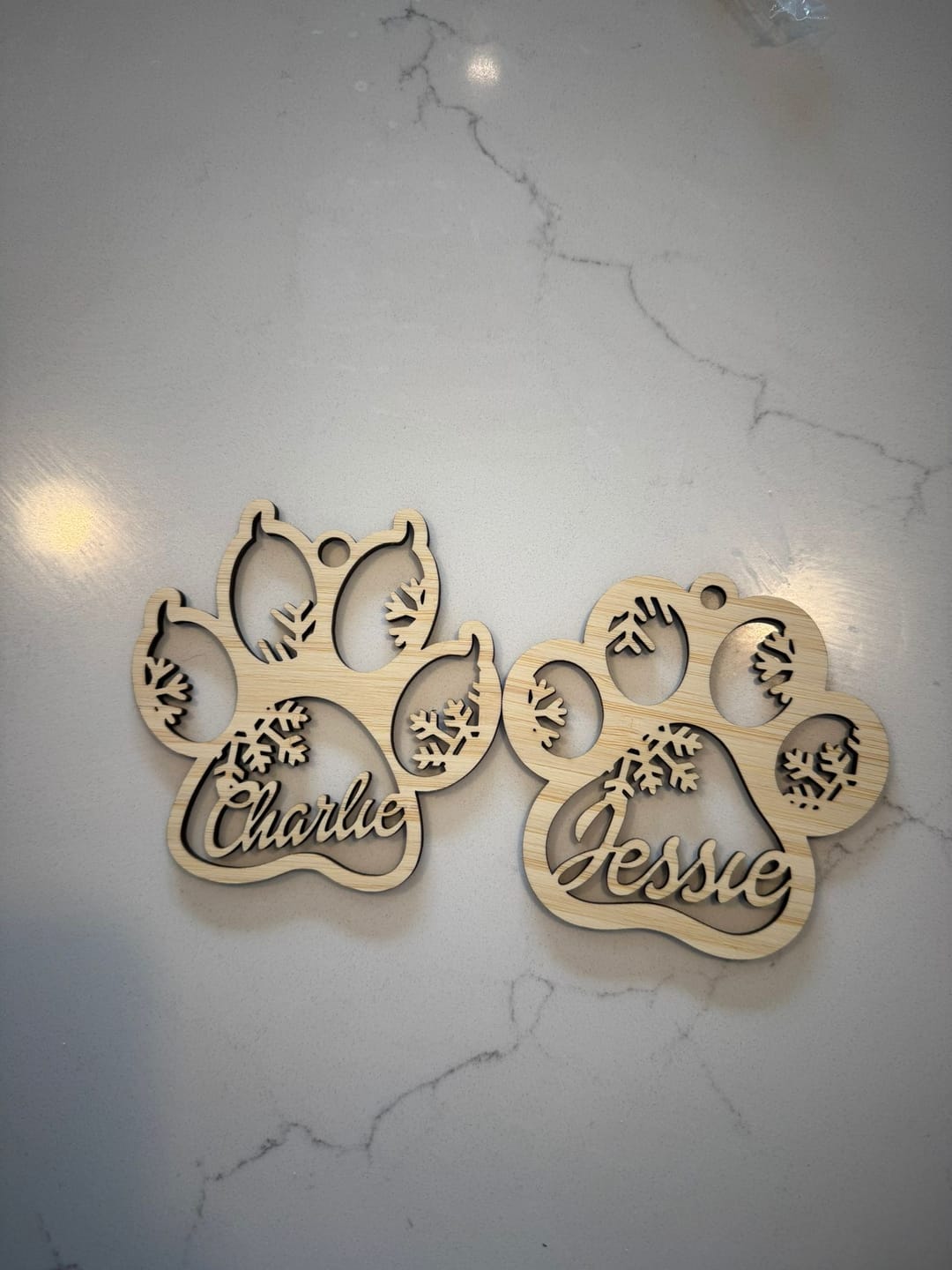 Customer photo review of Dog Paw Christmas Bauble Personalised