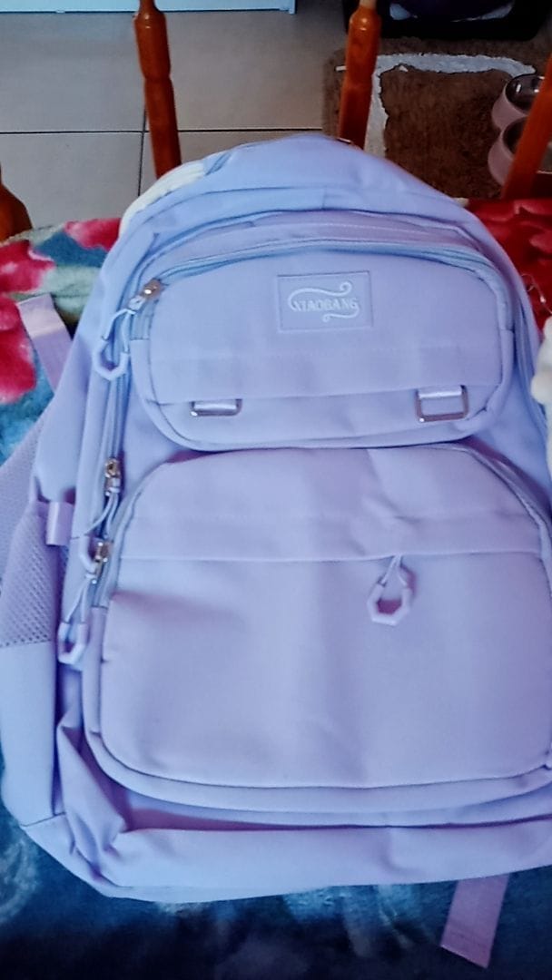 Customer photo review of Mochila Unissex Impermeável com porta-chaves Versátil