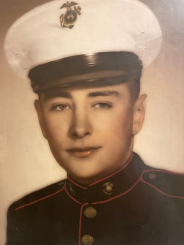 Customer's photo of a person in a Marine Corps dress uniform.