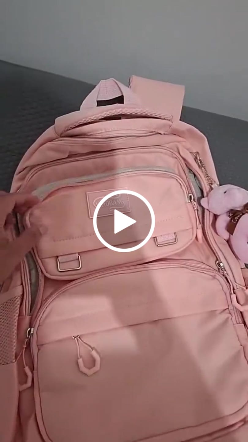 Customer video review of Mochila Unissex Impermeável com porta-chaves Versátil