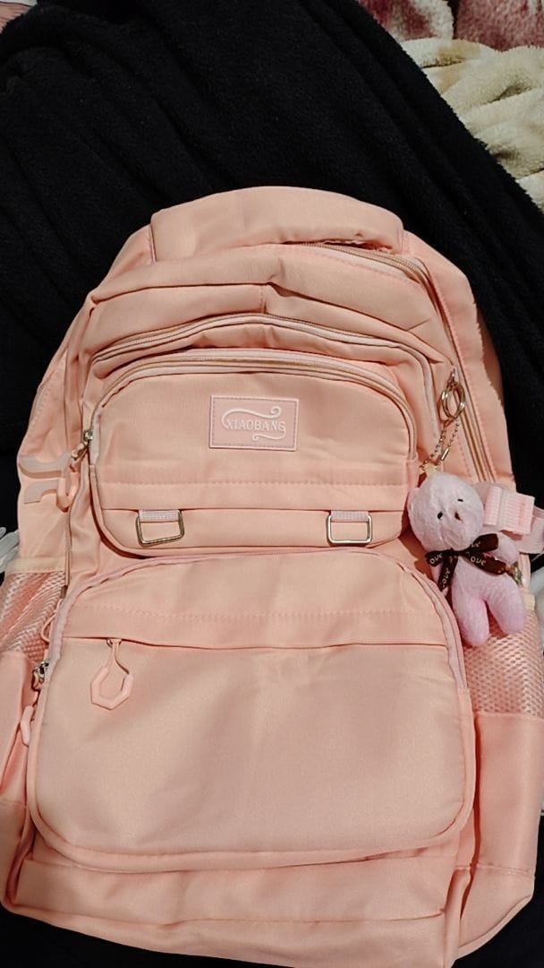 Customer photo review of Mochila Unissex Impermeável com porta-chaves Versátil