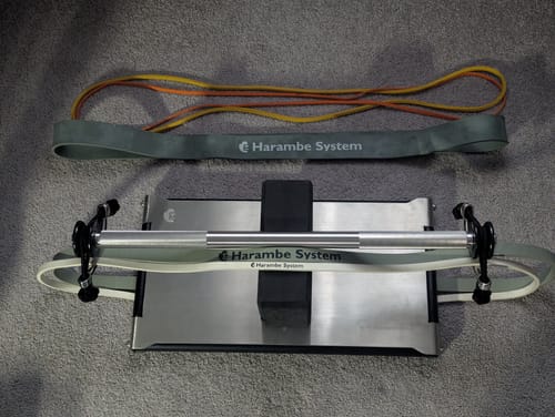 Customer's CyberPlate resistance band system assembled on the floor with multiple bands.