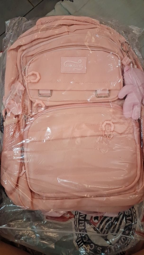 Customer photo review of Mochila Unissex Impermeável com porta-chaves Versátil