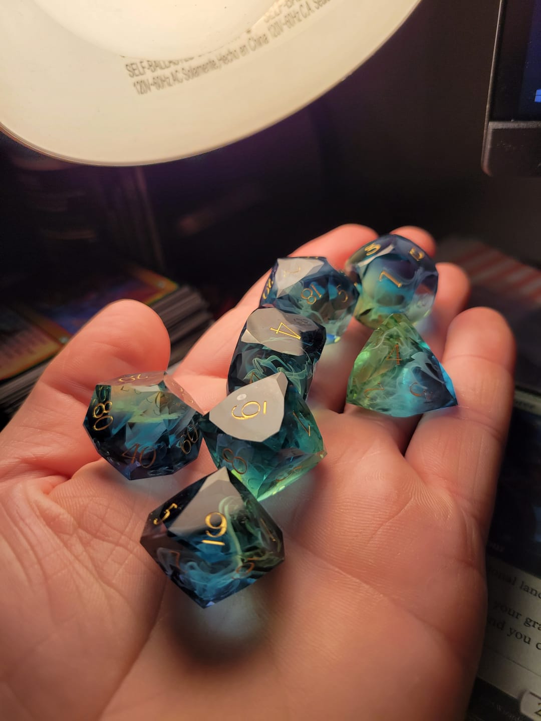 Customer photo review of URWizards D&D Resin Tidebound Fate Engraved Dice Set Multi-faceted Style