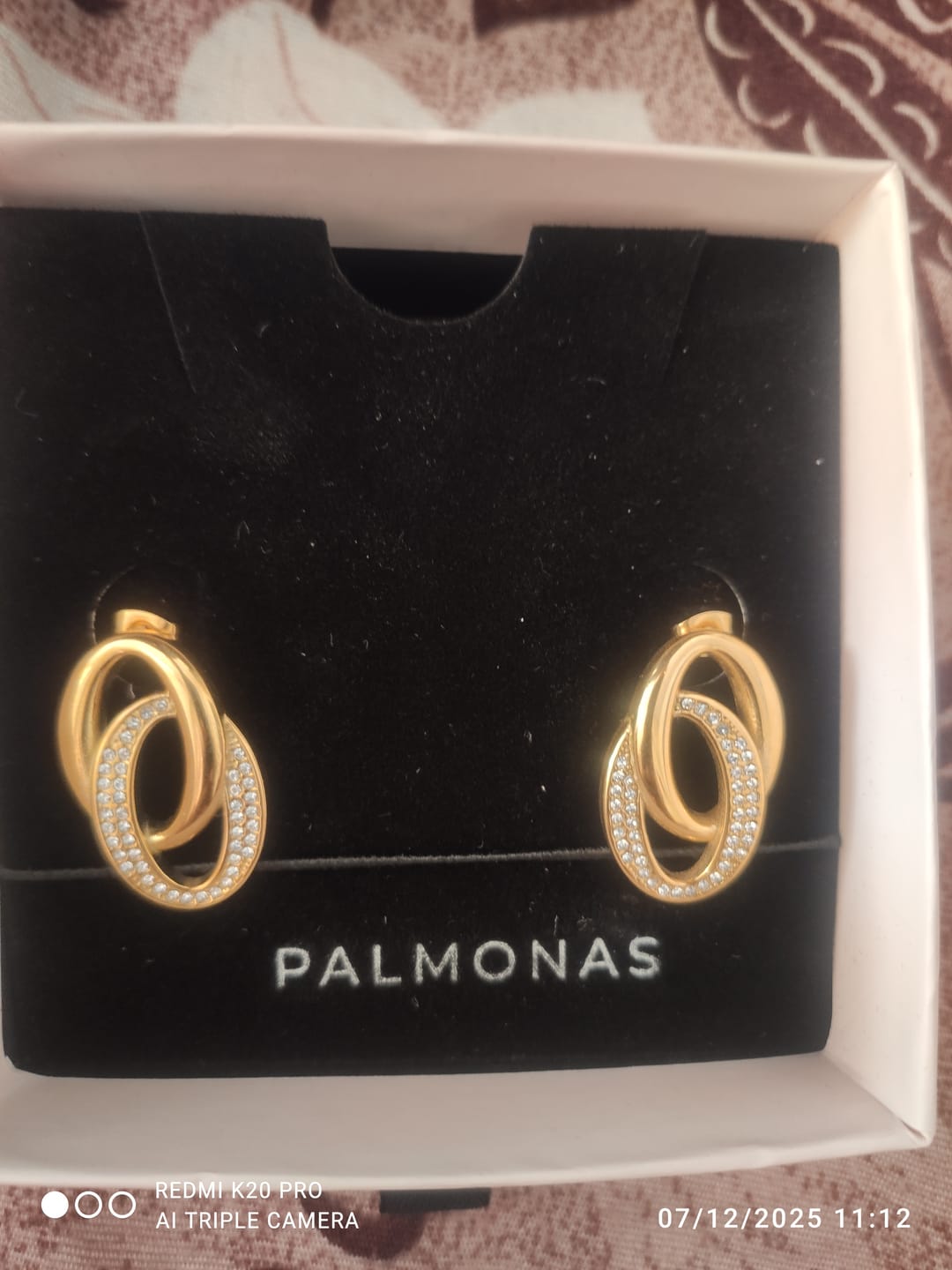 Customer photo review of Elegant Interlinked Stud Earrings
