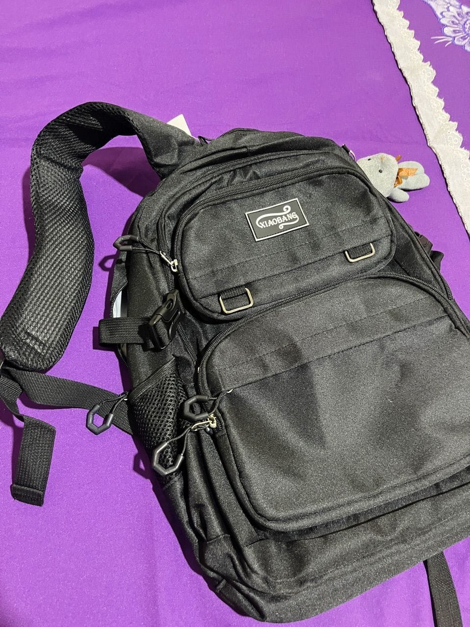 Customer photo review of Mochila Unissex Impermeável com porta-chaves Versátil