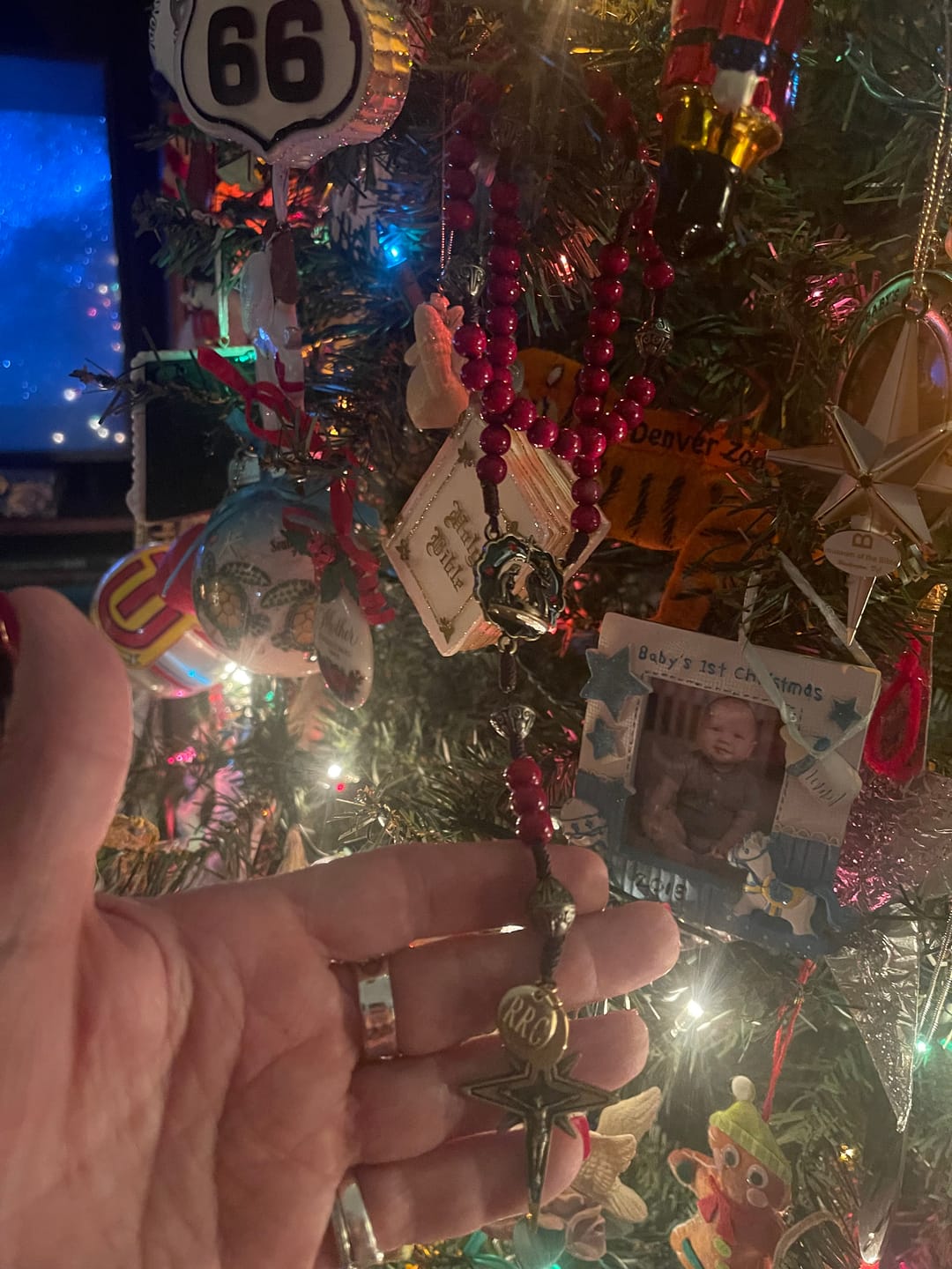 Customer photo review of FREE Today: Elegant Purple Bead with Glittering Star Christmas Rosary: Illuminate Holiday Spirit