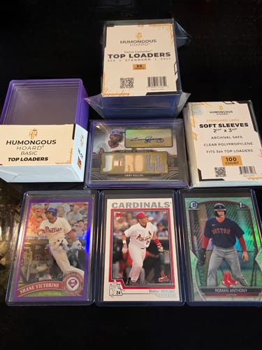 Customer protecting baseball cards with various clear top loaders and sleeves from the Sample Box.