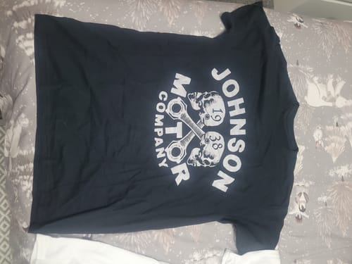 Customer's black unisex t-shirt with a 'Johnson Motor Company' graphic of two skull-like pistons.
