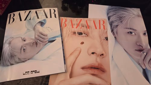 Customer's Bazaar Magazine with Lee Know cover, a variant cover, and a poster.