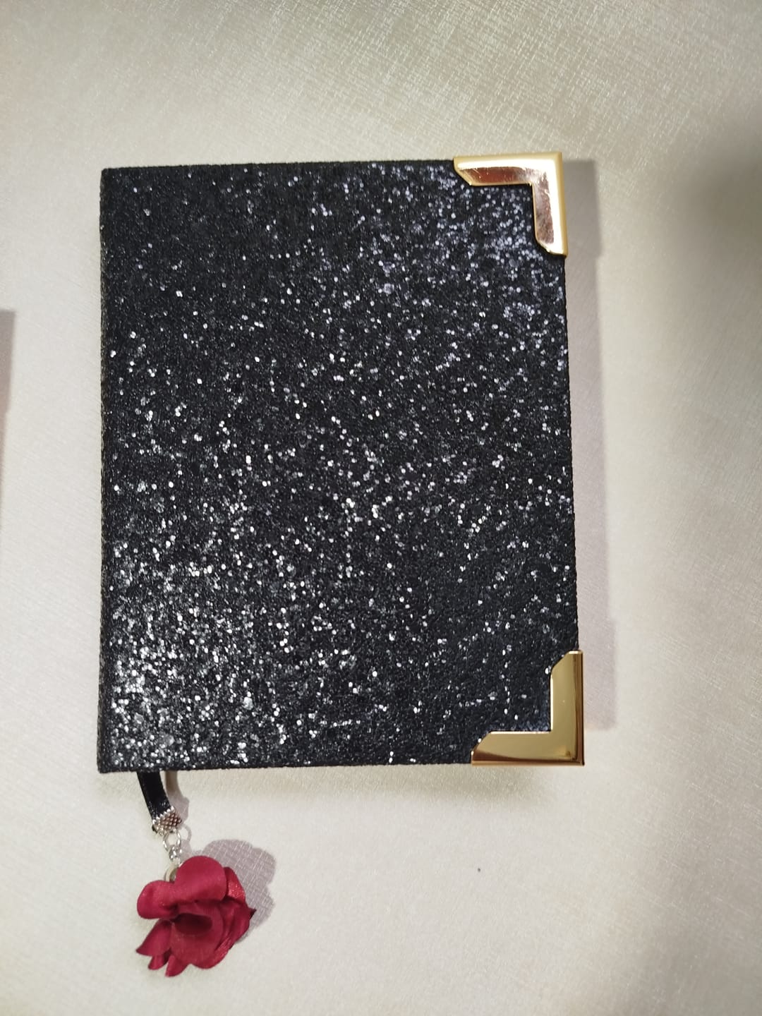 Customer photo review of SHINE GLITTER 0,8MM COM FUNDO SPUN COR PRETO