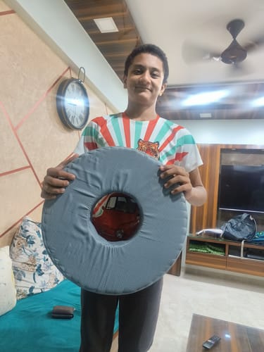 Customer photo review of Round Ring Cushion Pillow | Provides Cushioned Seating  to reduce Pain & Discomfort