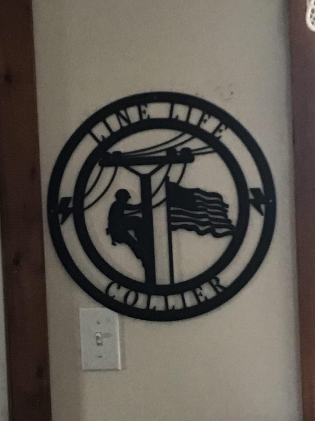 Customer photo review of Lineman Line Life Custom Metal Sign