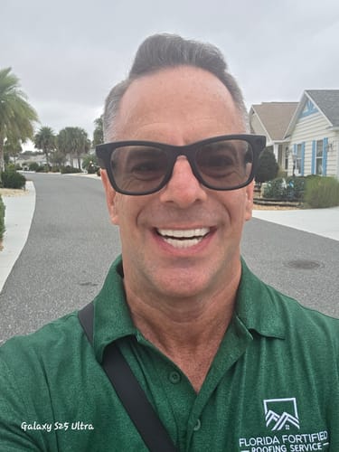 Customer smiles widely in an outdoor selfie, showing off their bright new Pop On Veneers.