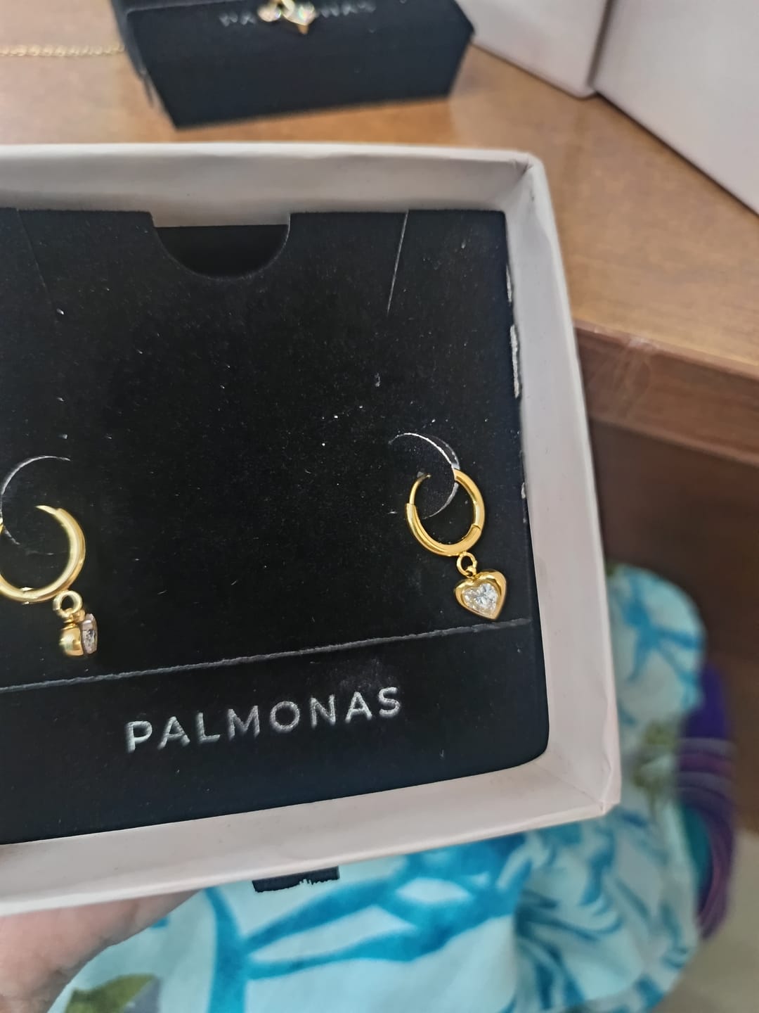 Customer photo review of Gemini Heart Hoops