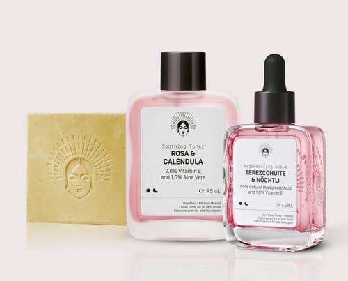 Reviewer's Barrier Protection Routine products, showing the embossed soap, pink toner, and serum bottle.