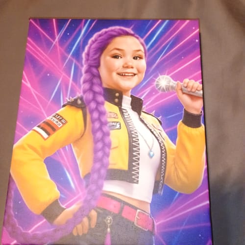 Customer's 'K-Pop Queen The Magic Beats' canvas. A child is depicted as a pop singer with long, purple braided hair and a microphone.
