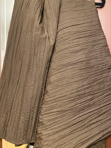 Customer's large piece of brown Plain Crinkle Polycotton Fabric, highlighting the distinct creased texture.