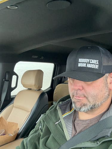 Customer photo review of NOBODY CARES WORK HARDER MICRO TRUCKER HAT
