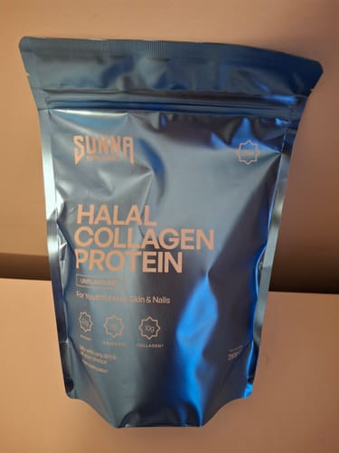 Customer's metallic blue pouch of Halal Collagen Protein from the Black Friday Bundle.