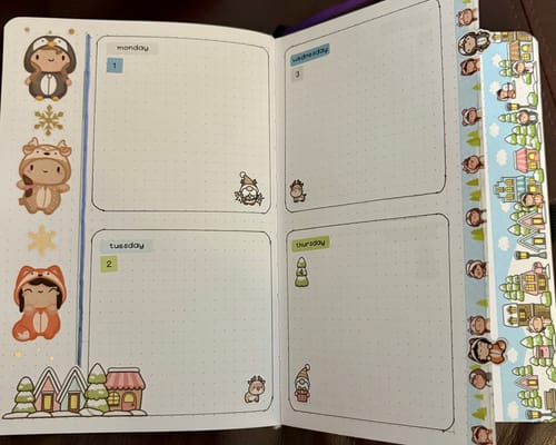 Reviewer's journal layout for Monday-Thursday using large character and winter town stickers from the Winter Onesie Town Journal Pack.