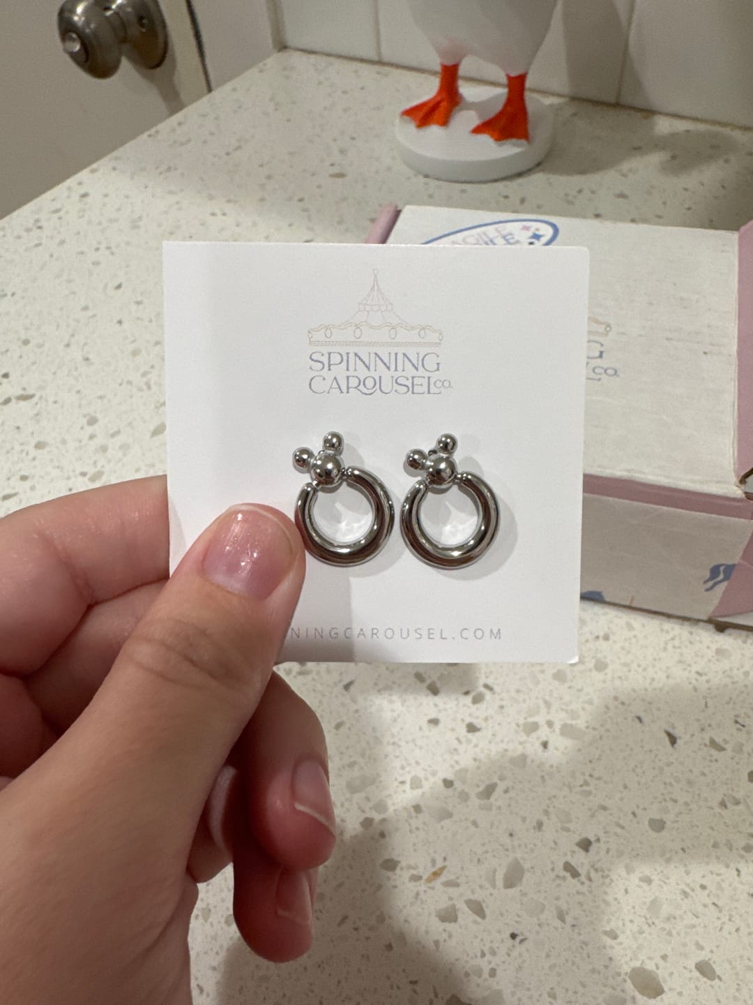 Customer photo review of Mini Leader of the Club Earrings
