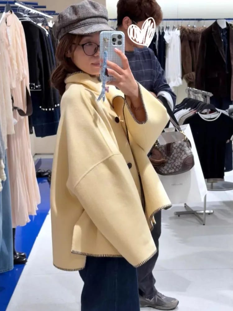 Customer photo review of Emma High Neck Button Jacket