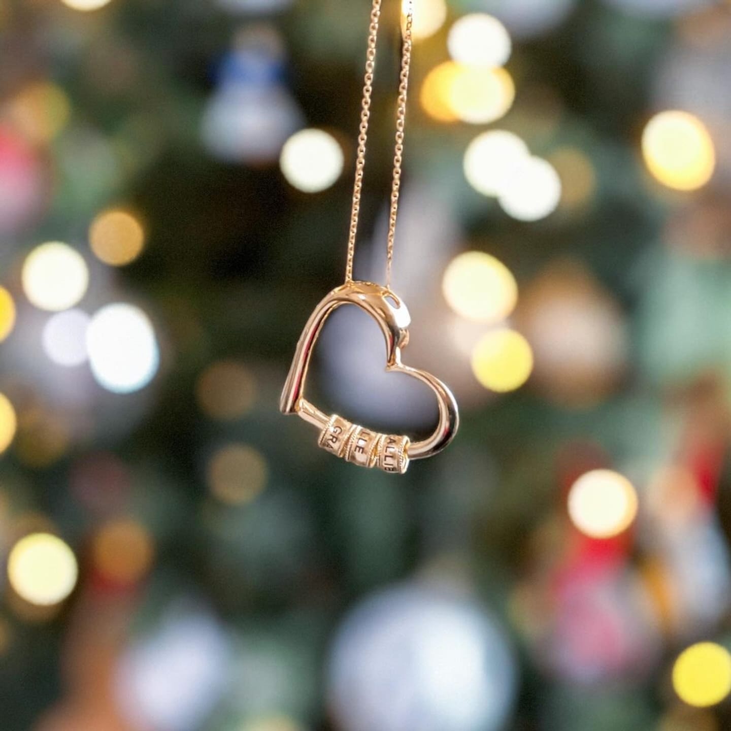 Customer photo review of Personalized Heart Necklace with Engraved Name Beads