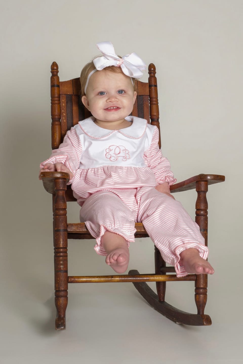 Customer photo review of Pink & White Stripe Ruffle Romper