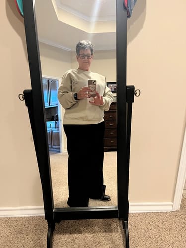 Reviewer's mirror selfie showing the fit of the High Waist Black Retro Wide Leg Jeans.