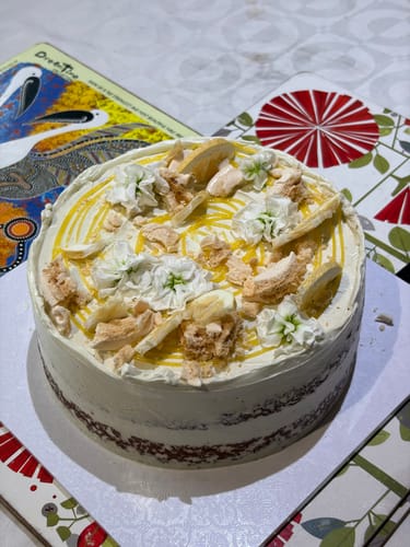 Customer photo review of lemon meringue cake