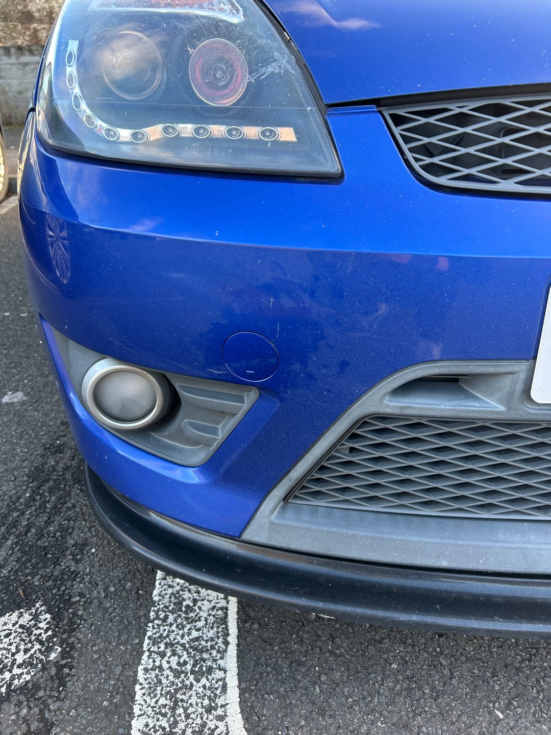 Customer photo review of Genuine Ford Tow Eye Cover - Mk6 Fiesta ST150 / Zetec S