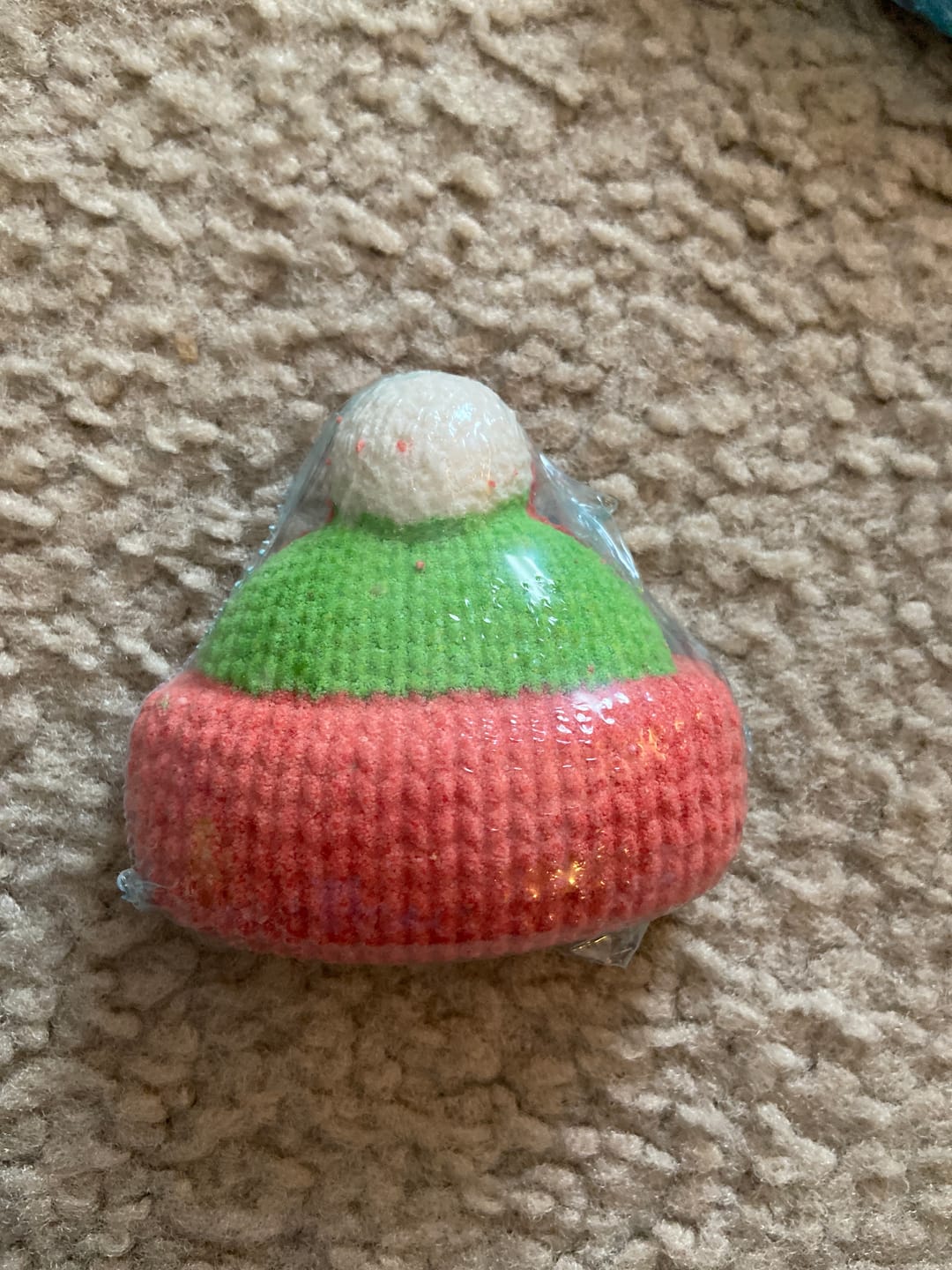 Customer photo review of Winter Cap Christmas Kids Bath Bomb with Little Capped Penguin Toy Inside