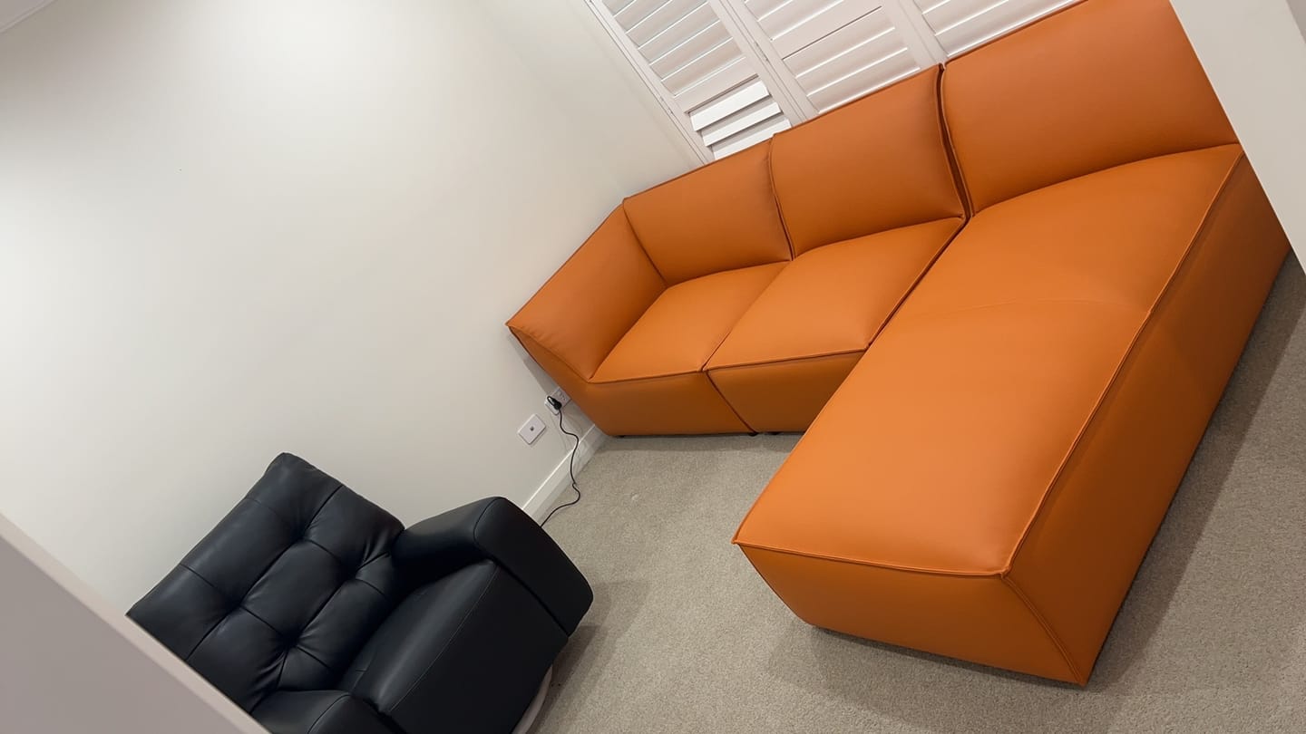 Customer photo review of Minimalist Orange 4.5 Seat Leather Chaise Sofa