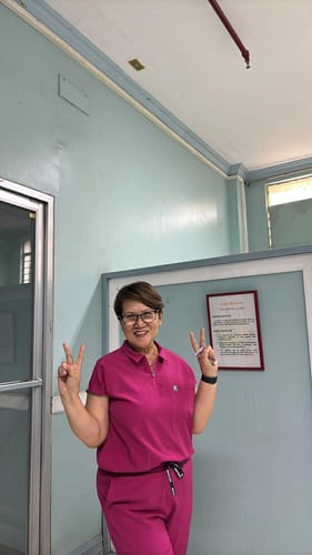 Customer photo review of Zip-Up Polo MoveTech® Scrub Top - Women / Orchid Crush