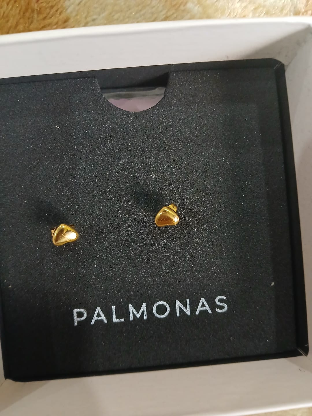 Customer photo review of Minimalist Heart Stud Earrings