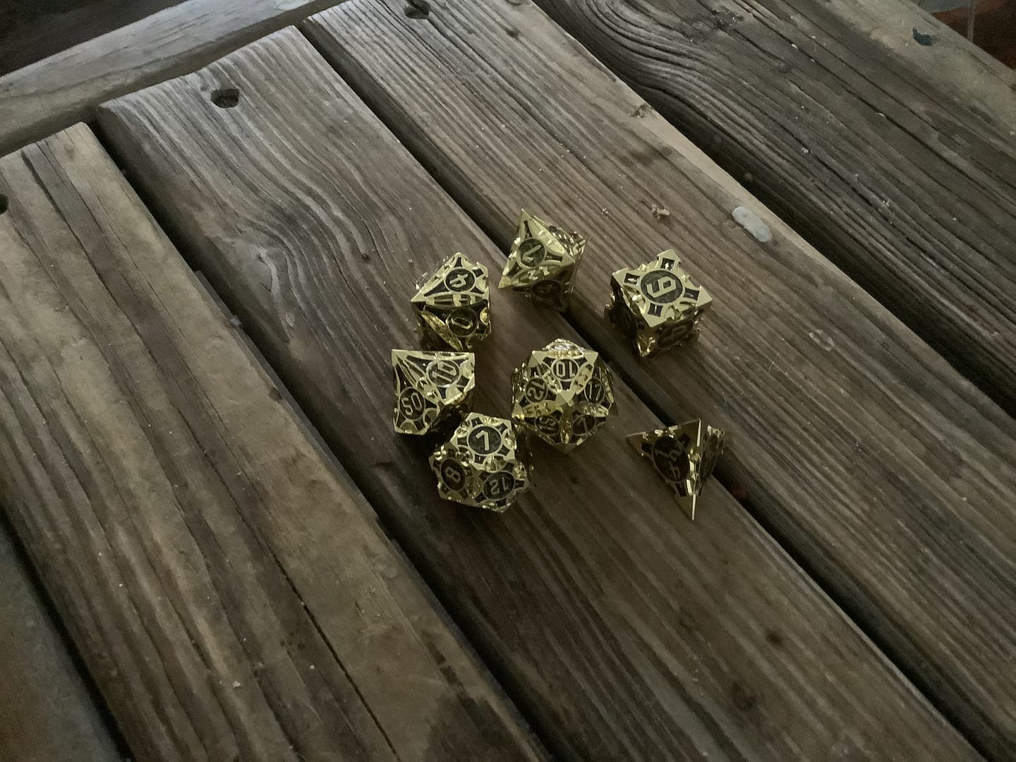 Customer photo review of Black Gold Golden Obelisk Metal Dnd D&d Dice Set