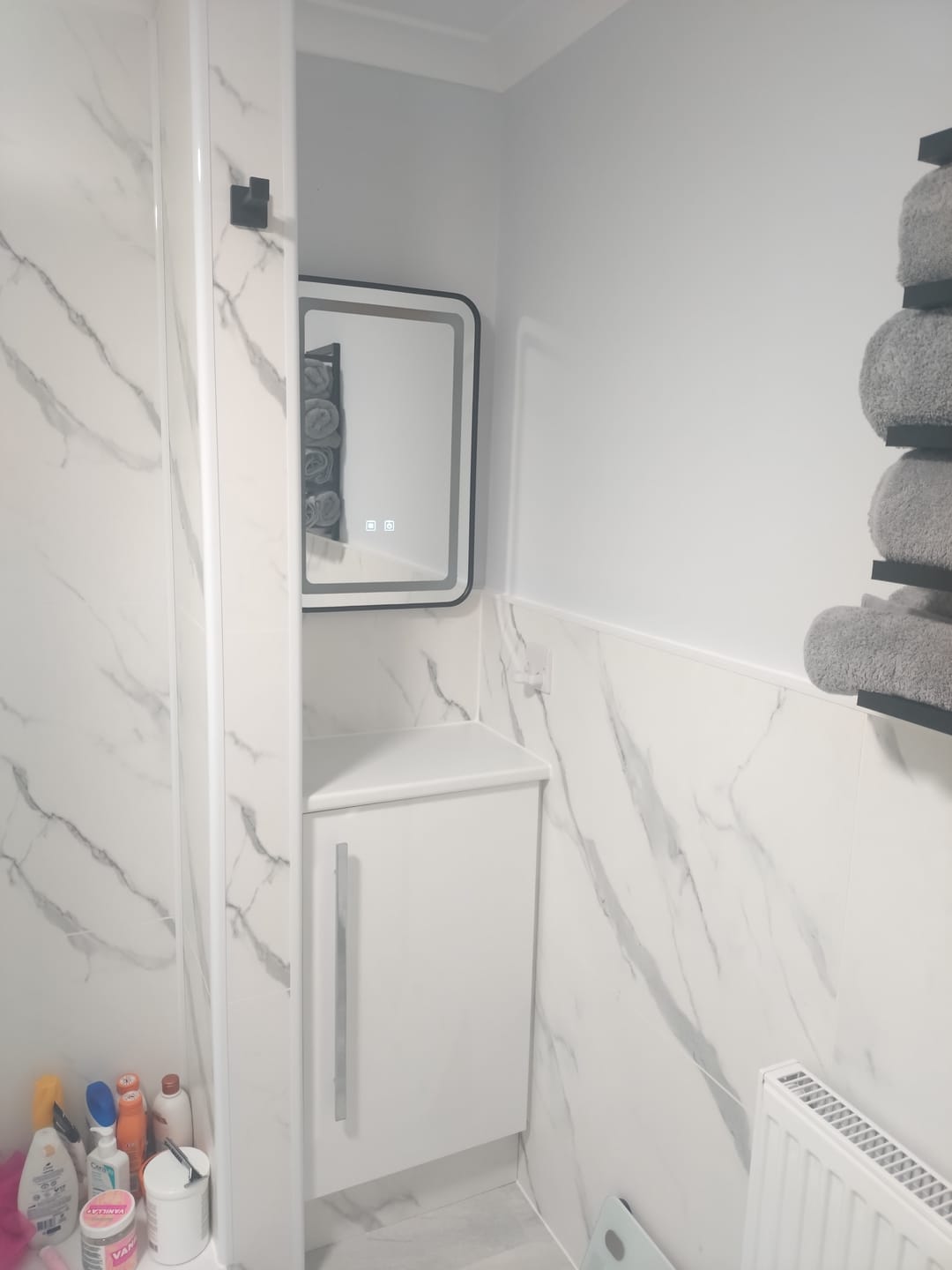 Customer photo review of 10mm Large Tile Carrara Marble Matt Shower Panel 1M x 2.4M