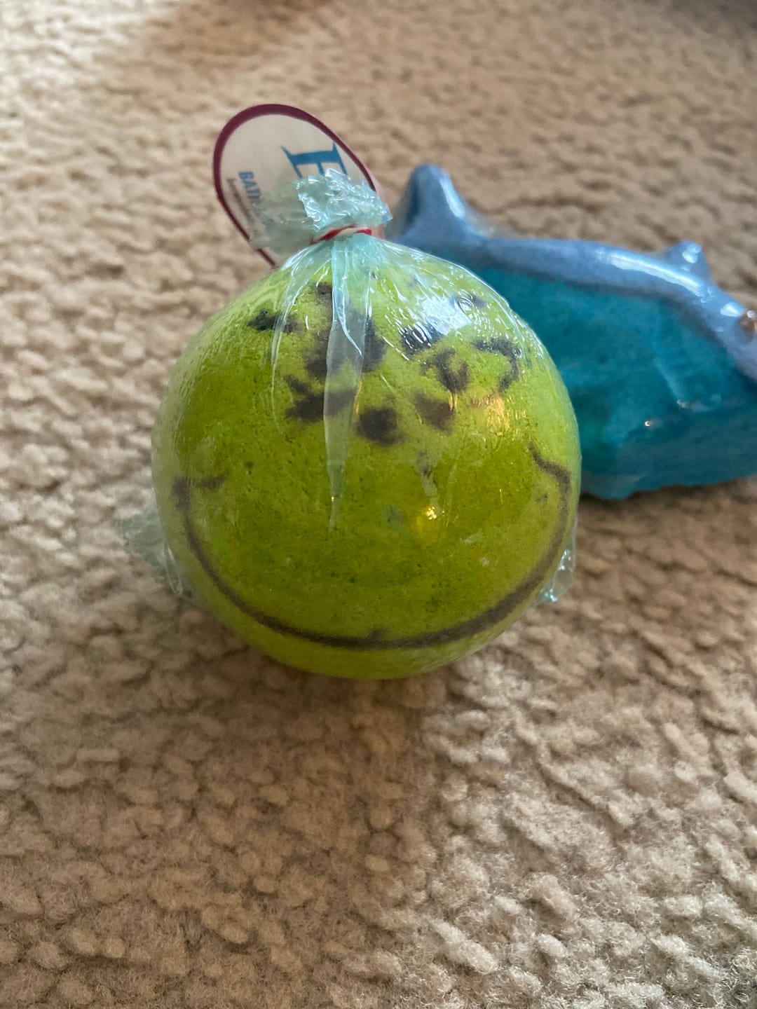 Customer photo review of Grinch Christmas Kids Bath Bomb with Toy Grinch Mini Figure Inside