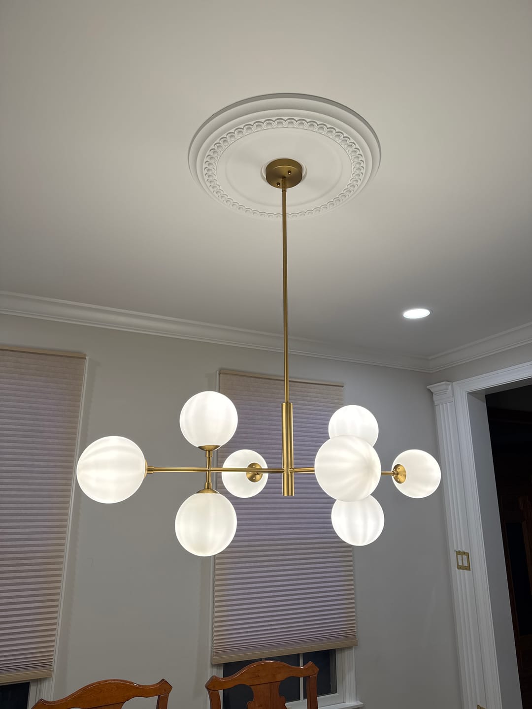 Customer photo review of 8-Light Linear Sputnik Frosted Glass Globe Chandelier