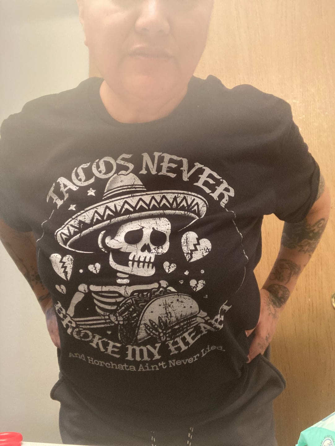 Customer photo review of Tacos Never Broke My Heart Horchata Never Lied T-Shirt