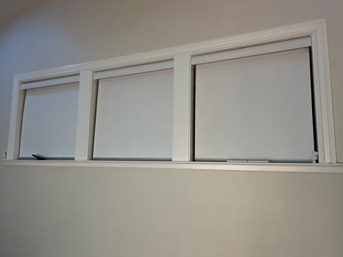 Customer photo review of SmartWings Hardwired Motorized Roller Shades 100% Blackout Essential