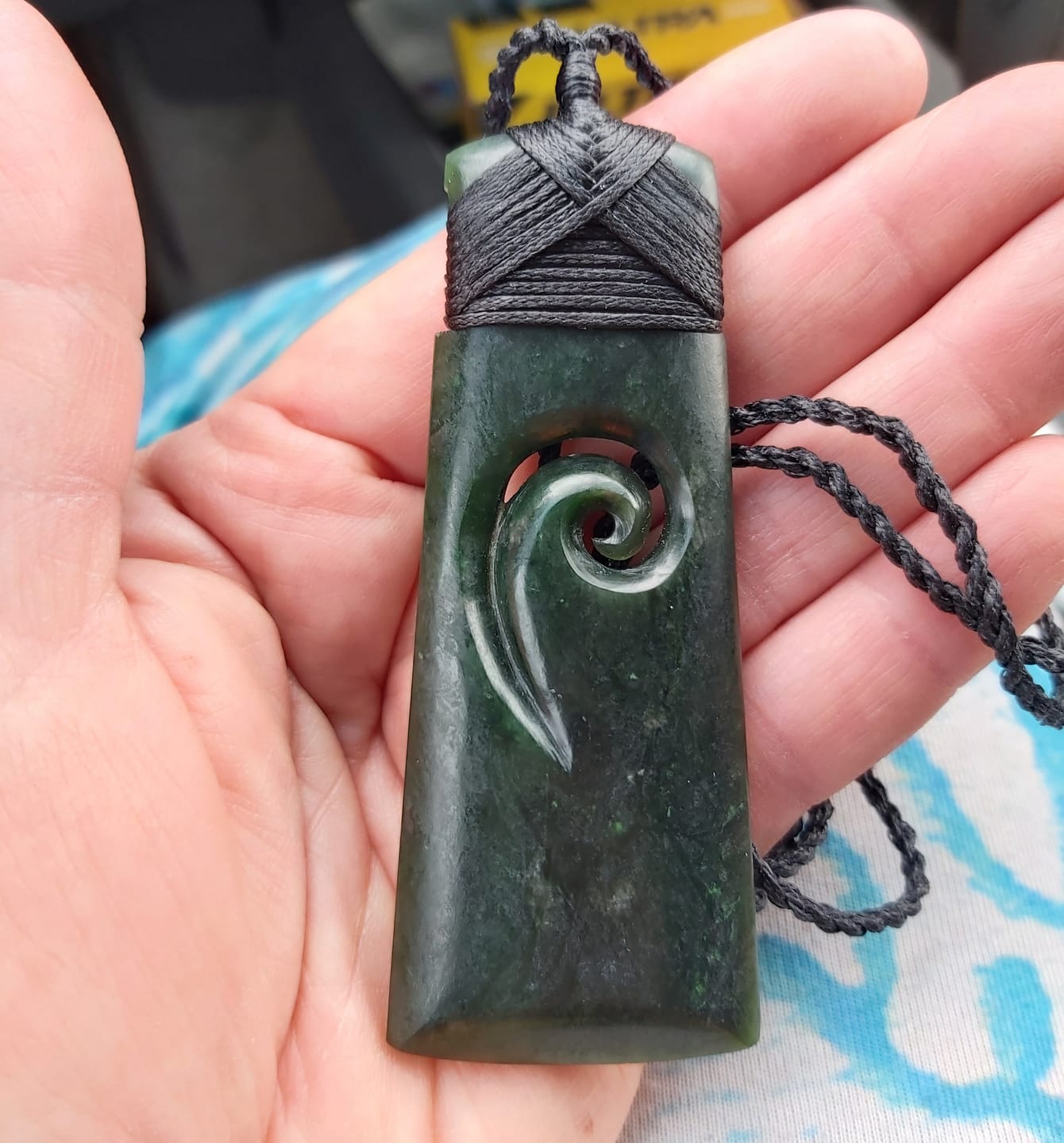 Customer photo review of Genuine NZ Greenstone Toki with Inner Koru Necklace