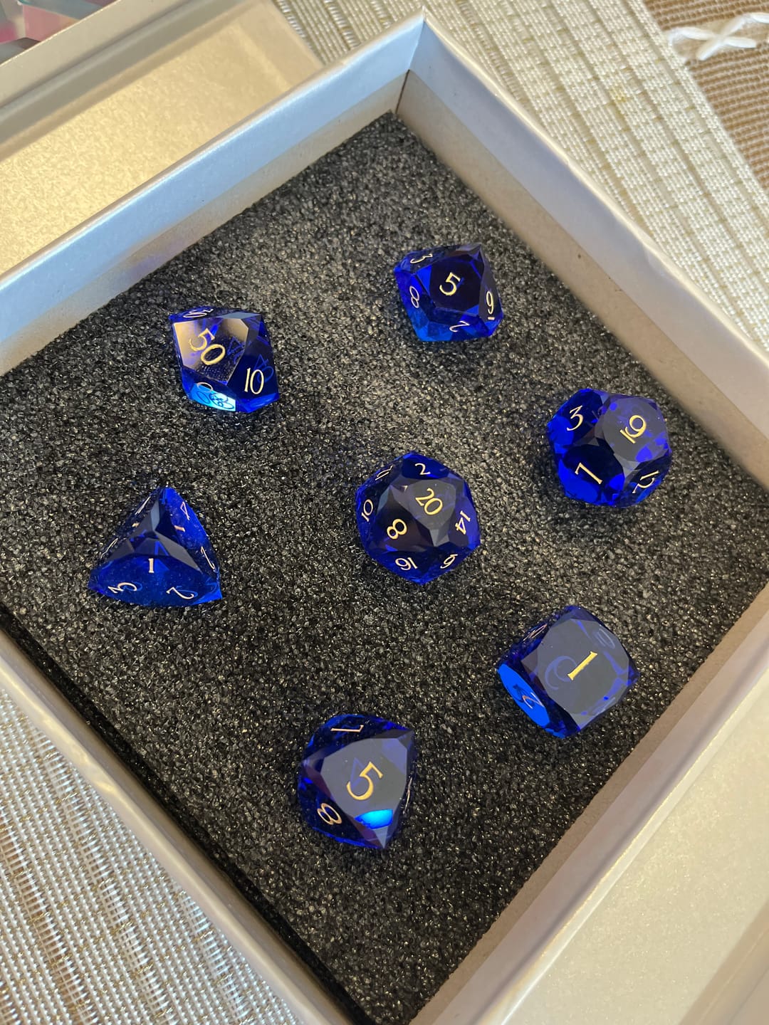 Customer photo review of URWizards D&D Multi-faceted Colorful Glass Engraved Dice Set