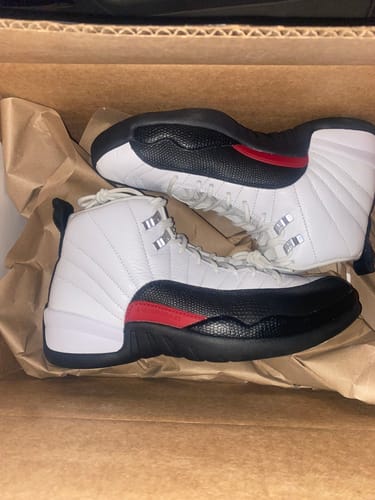 Customer photo review of Jordan 12 Retro Taxi Flip