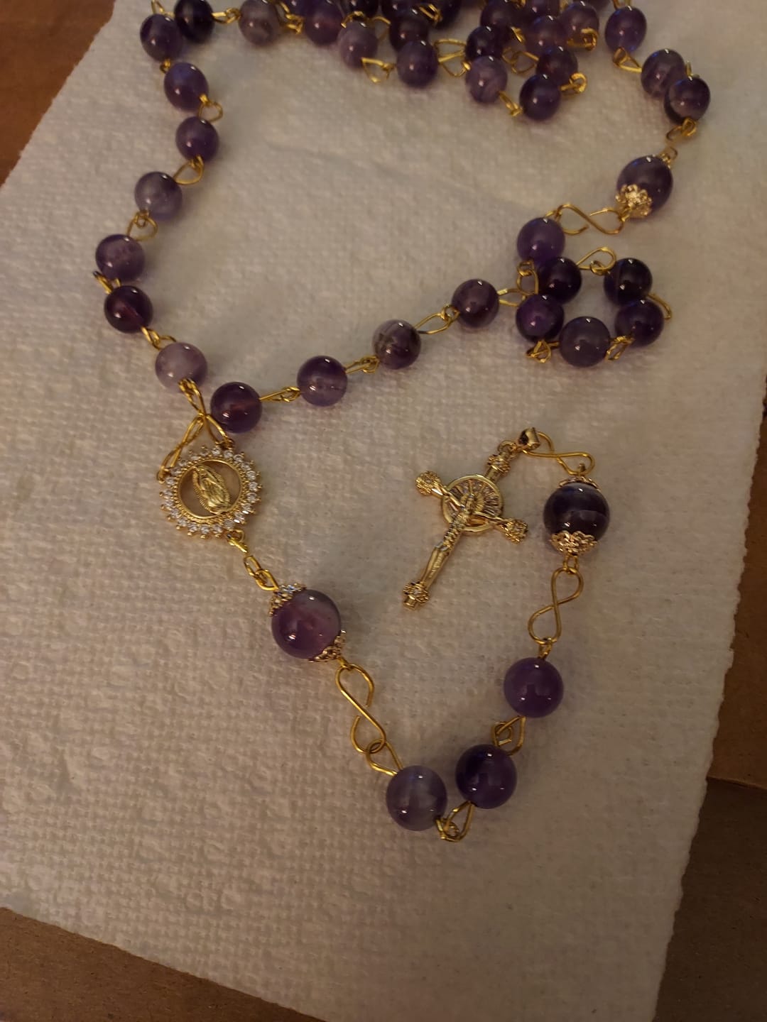 Customer photo review of Christianartworkshop Our Lady of Guadalupe & Crucifix of 8mm Round Purple Crystal Rosary