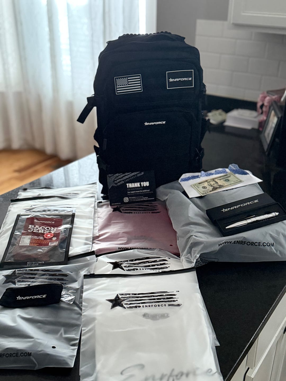 Customer photo review of Mystery Cash Loaded Backpack