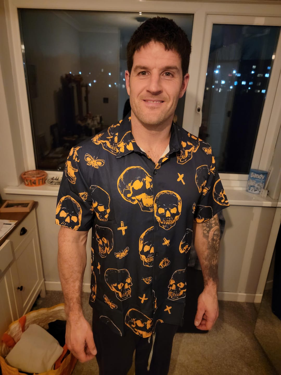 Customer photo review of Men's Orange Skull Print Art Graphic Button up Short Sleeve Aloha Hawaiian Shirt