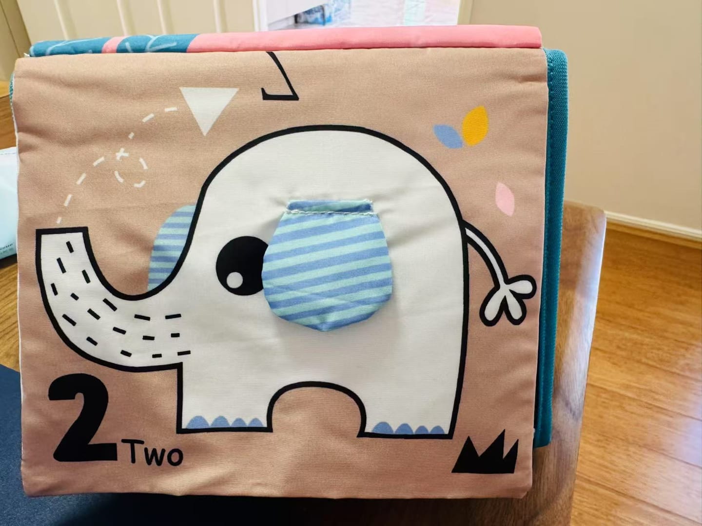 Customer photo review of Tummy Time Foldable Mirror with Interactive Sensory Book